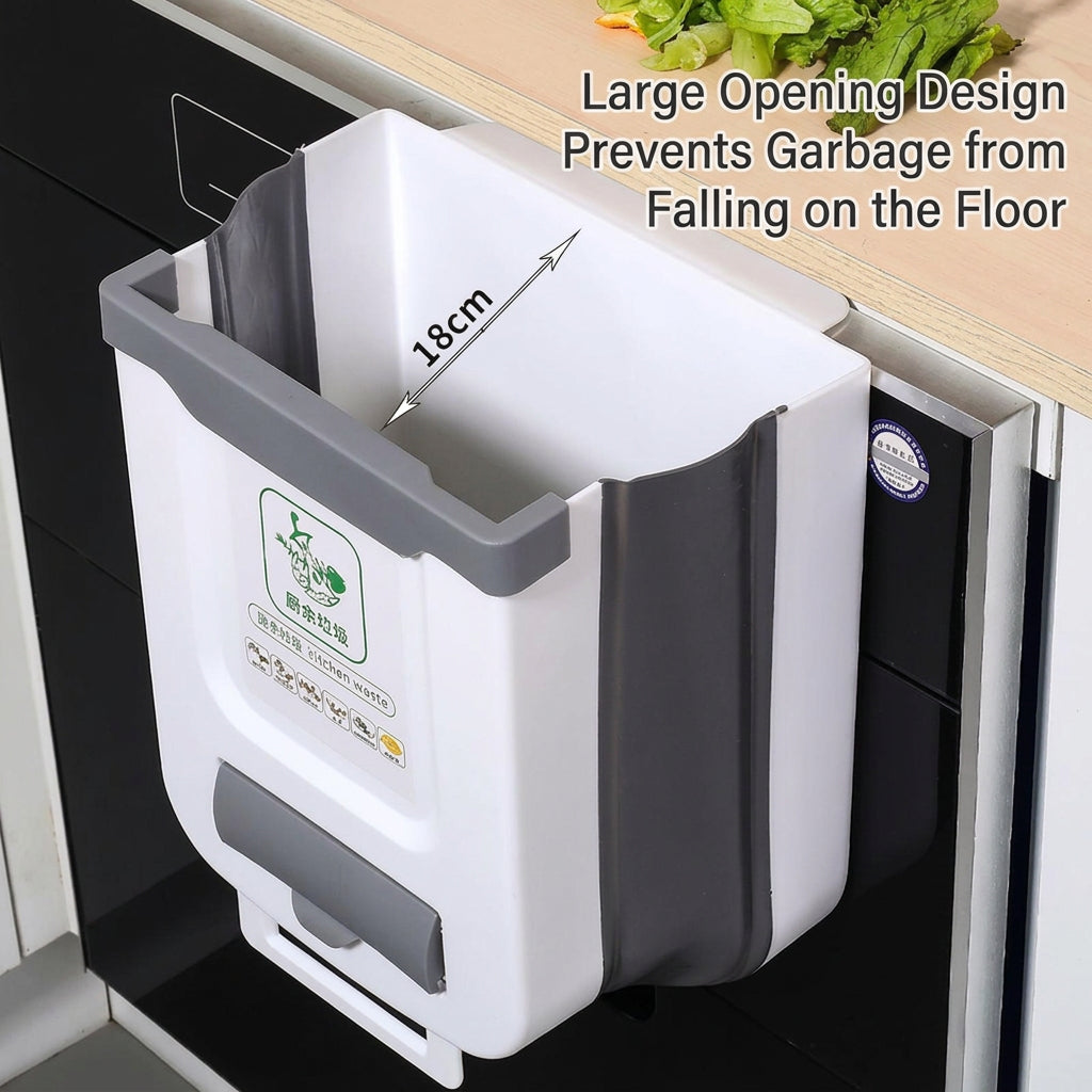 A white and gray collapsible under-the-sink trash can shown mounted on a kitchen sink. The image includes English text overlays explaining the large opening design and anti-fall feature, with a 18cm depth measurement arrow.